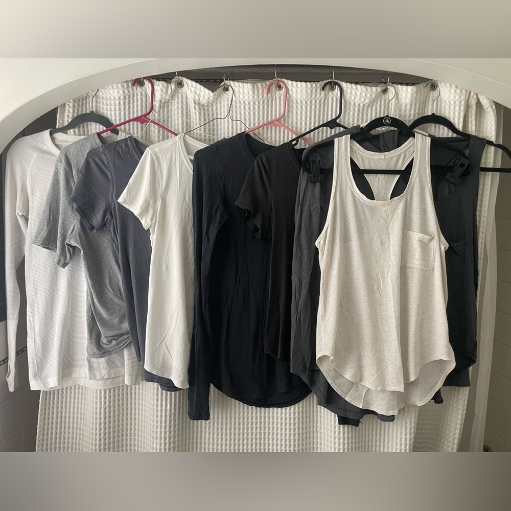 bundle of 9 lululemon shirts, mostly size 6, one is size 8